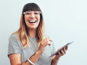 Close up of a smiling creative artist at work